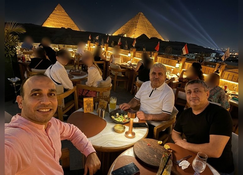 Dinner with the Golden Tech team in Cairo, overlooking the pyramids